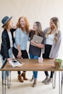 a group of women standing around a wooden table