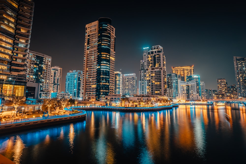 a view of a city at night from across the river