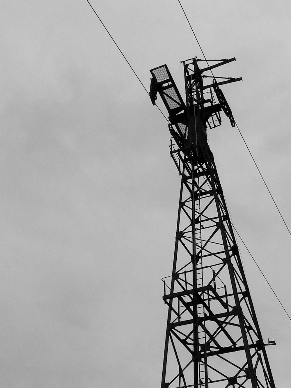 a black and white photo of a tower