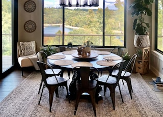 a dining room with a table and chairs