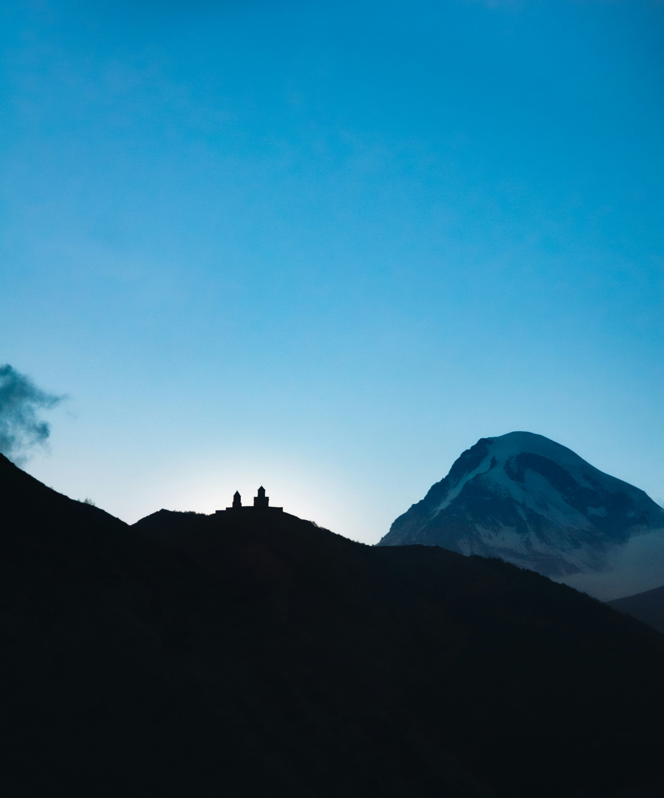 A couple of people standing on top of a hill photo – Free Nature Image ...