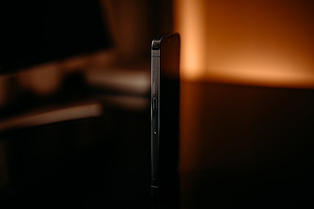 a close up of a cell phone on a table