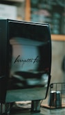 A sleek design of the machine displayed against a neutral background.