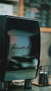 A sleek espresso machine in a modern café setting.