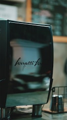 A sleek, modern ice machine displayed in a professional kitchen setting.