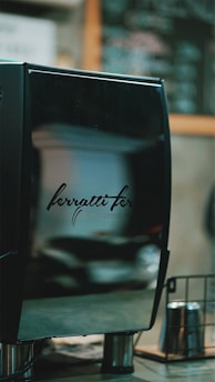 A sleek, modern ice machine displayed in a professional kitchen setting.
