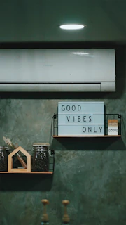 a couple of shelves that have a sign on them