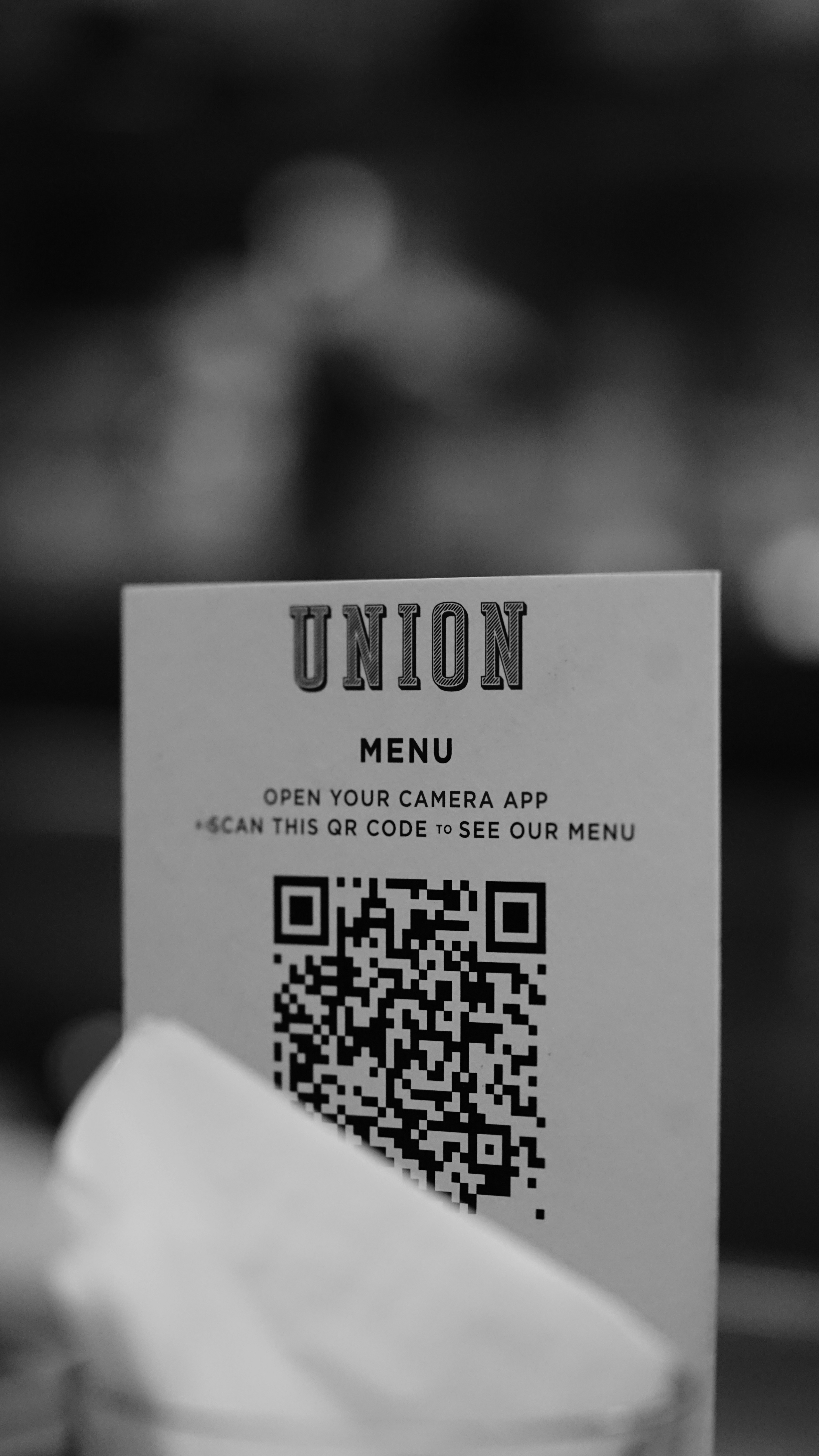 Restaurant owner using smartphone