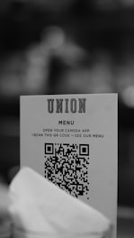 a piece of paper with a qr code on it