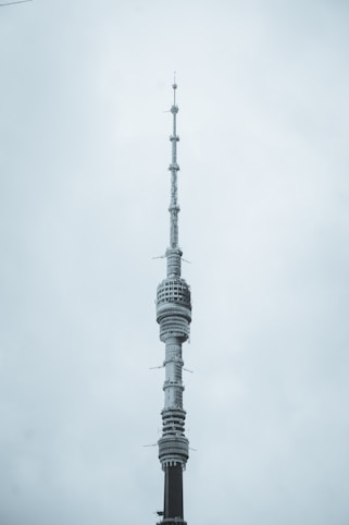 a tall tower with a sky background