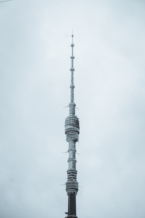 a tall tower with a sky background