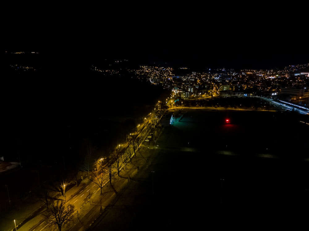 an aerial view of a city at night