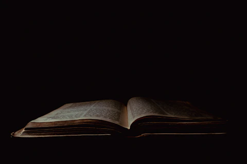 an open book sitting on top of a table