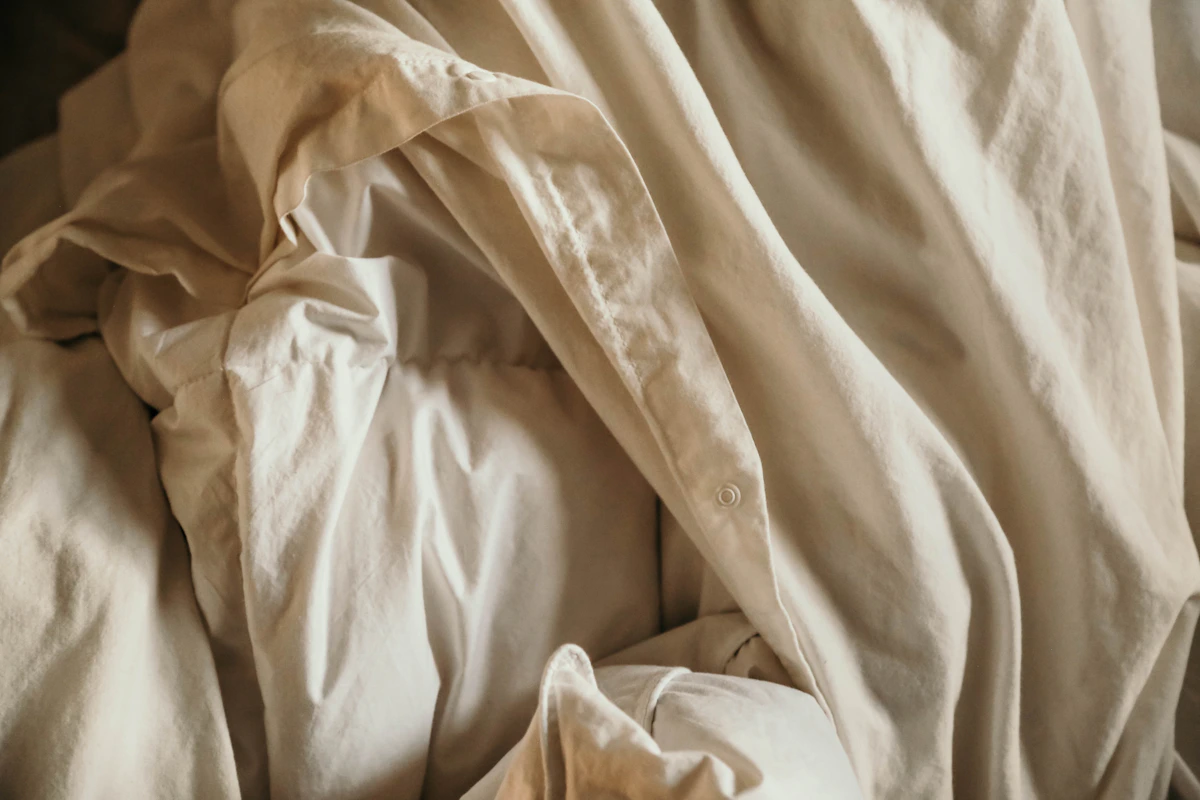 Close view of natural cotton sheets and a duvet cover