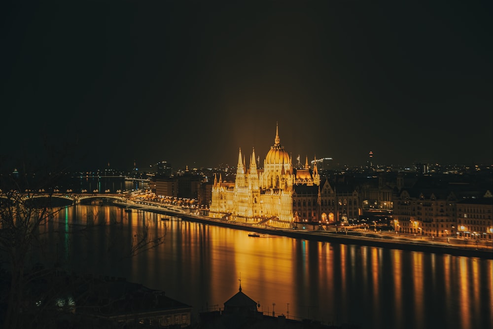 a night view of a city and a bridge