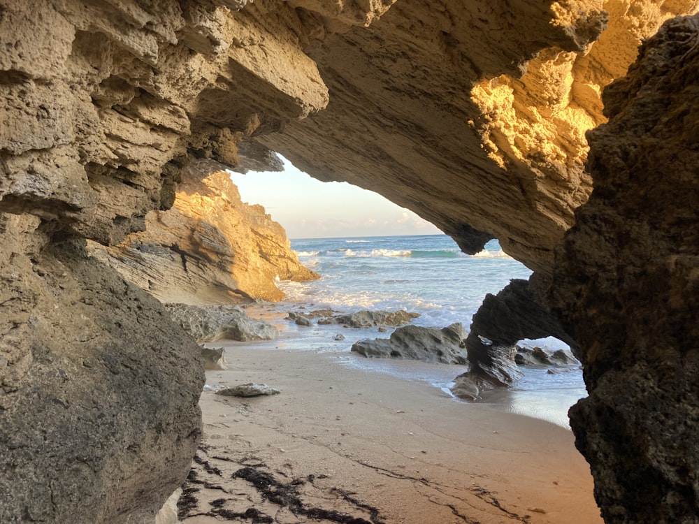 a beach that has some rocks on it