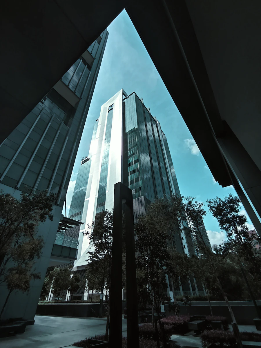 A tall office tower above a city skyline
