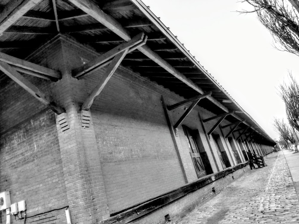 a black and white photo of a brick building