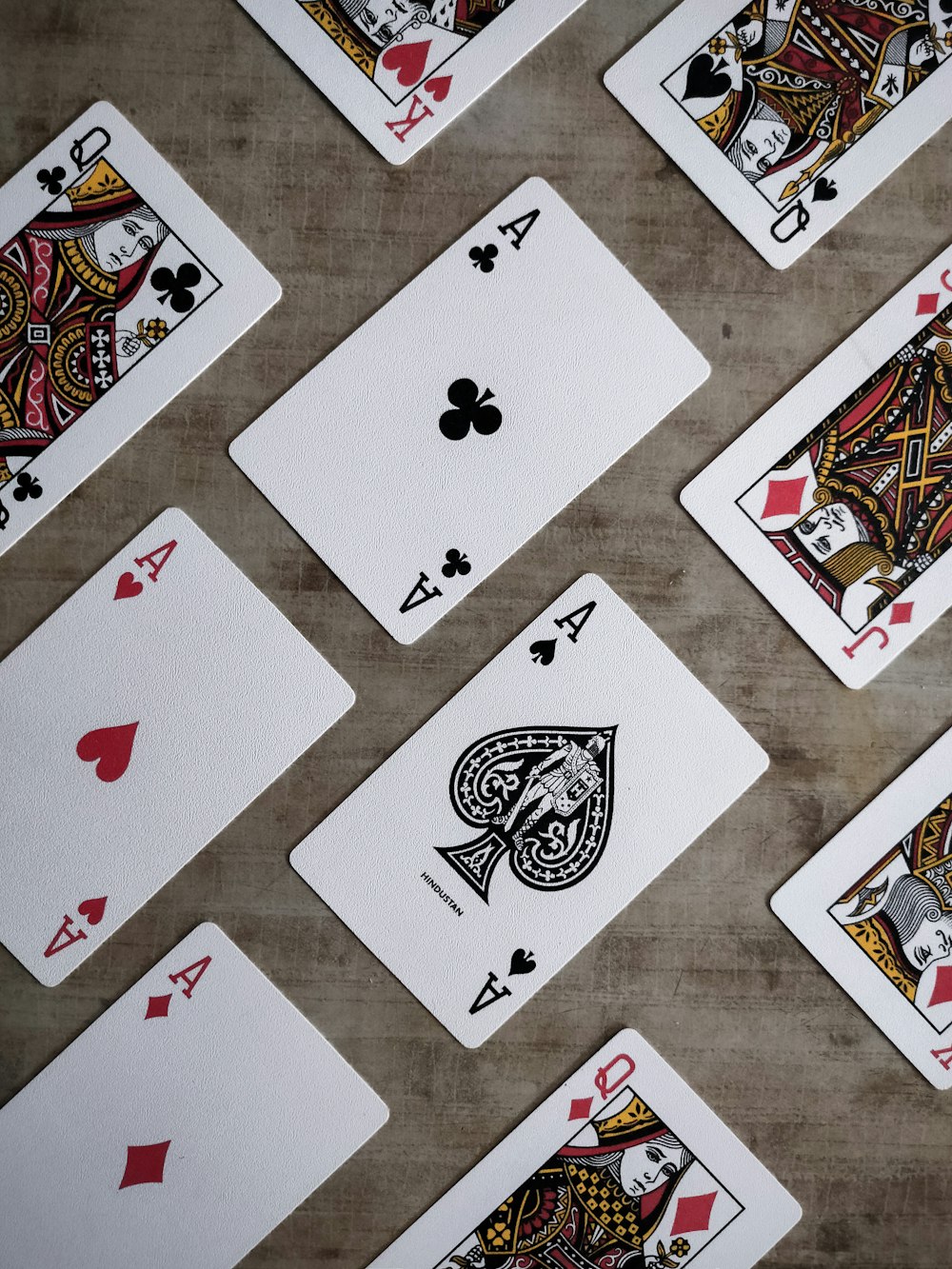 a table topped with lots of playing cards