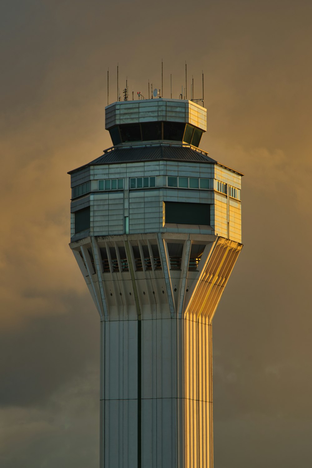 a tall tower with a sky in the background