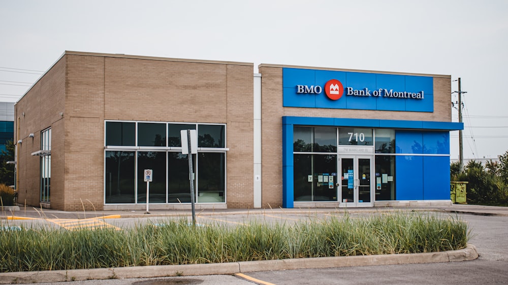 an empty parking lot in front of a bank of america