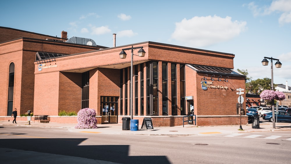 a large brick building sitting on the side of a road