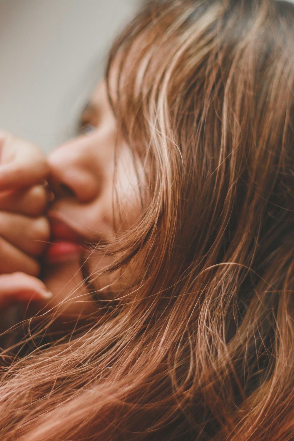 a close up of a person with long hair