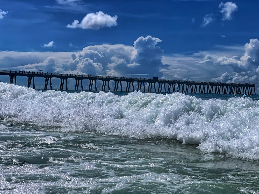 a pier that is next to a body of water