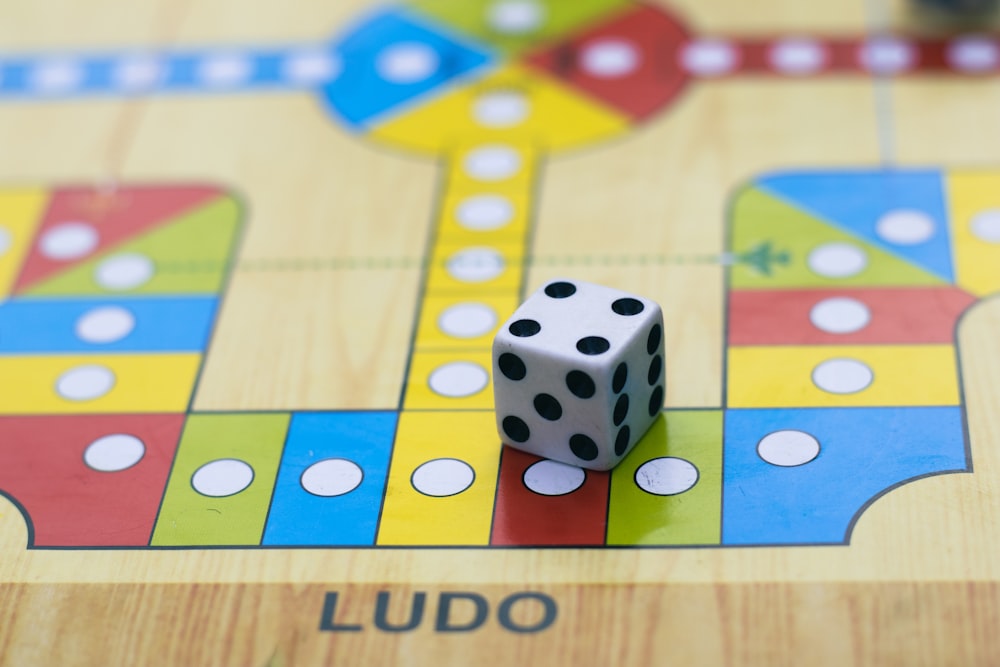 a close up of a dice on a board game