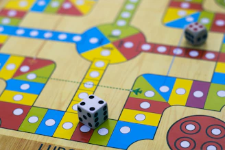 a close up of a board game with dices