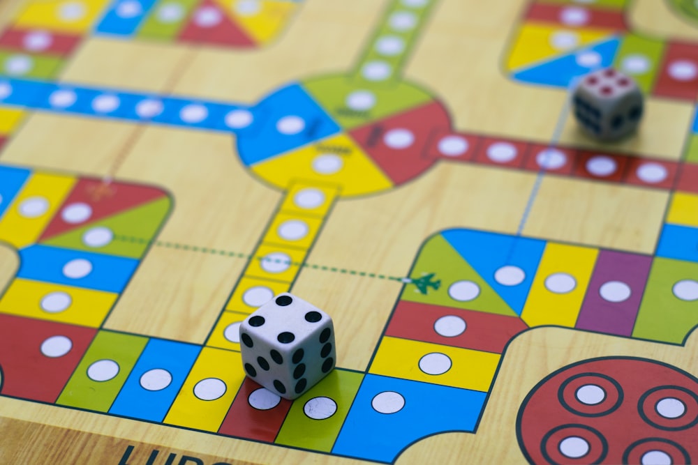 a close up of a board game with dices