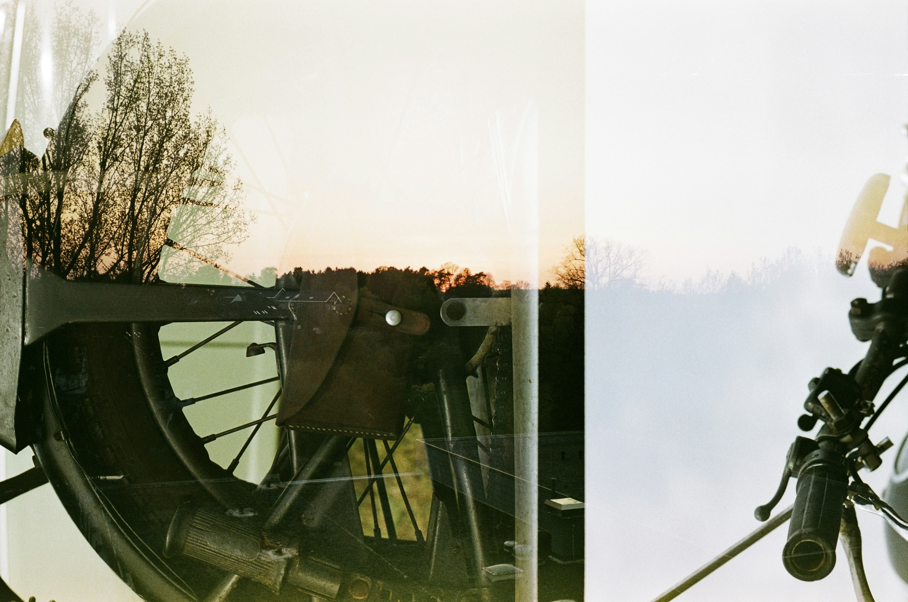 a reflection of a bike in a window