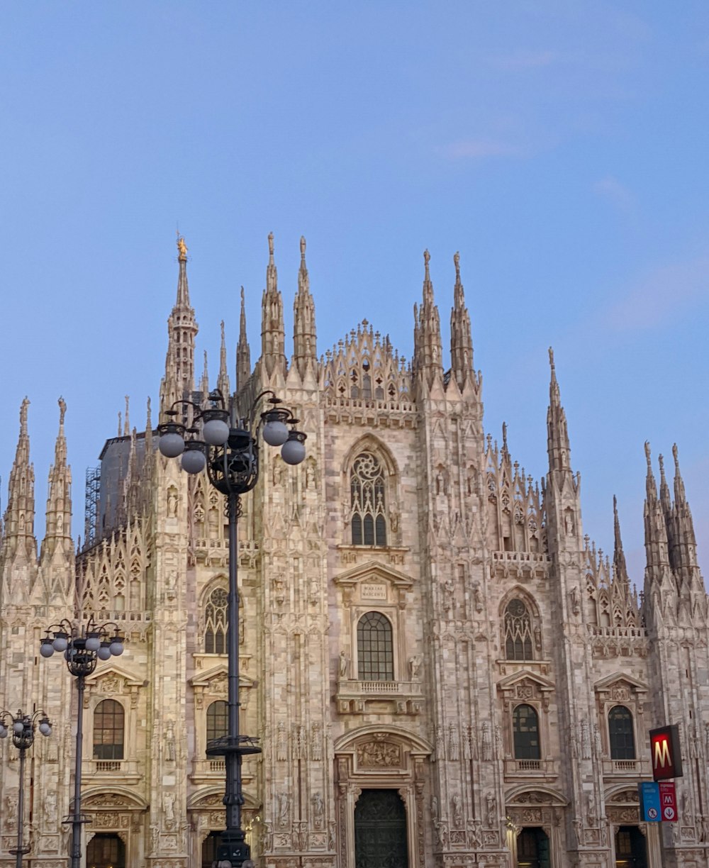 a large cathedral with a clock on the front of it