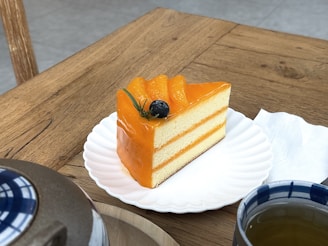 a piece of cake sitting on top of a white plate
