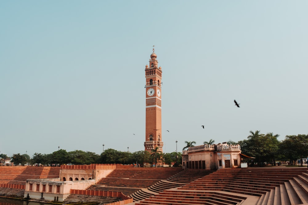 a tall clock tower towering over a city