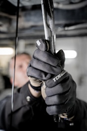 a man holding a pair of scissors in his hands