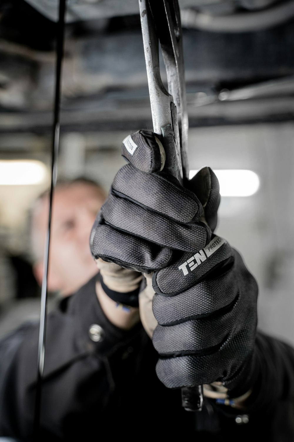 a man holding a pair of scissors in his hands