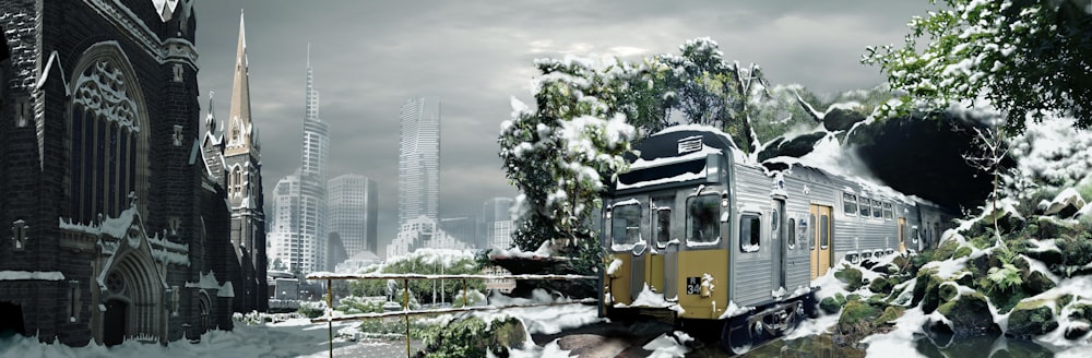 a train traveling through a snow covered city