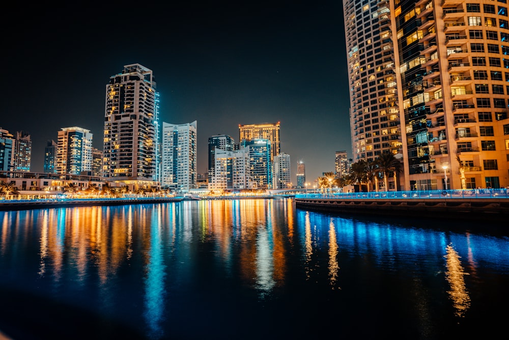 a view of a city at night from across the water