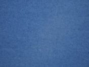 an airplane is flying in the blue sky