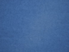 an airplane is flying in the blue sky