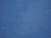 an airplane is flying in the blue sky
