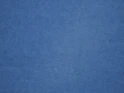 an airplane is flying in the blue sky