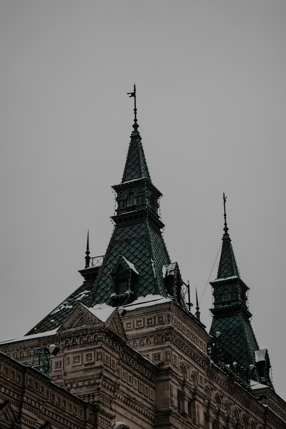 a very tall building with a clock on it's side