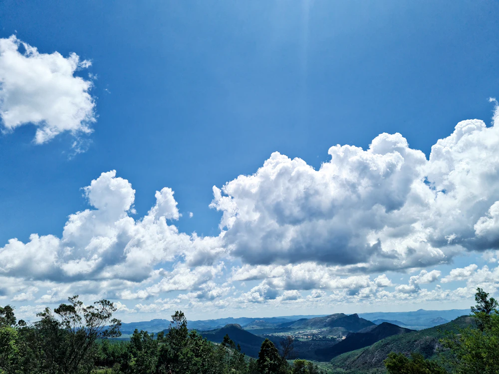 Green mountain slopes and cloud in Nyanga