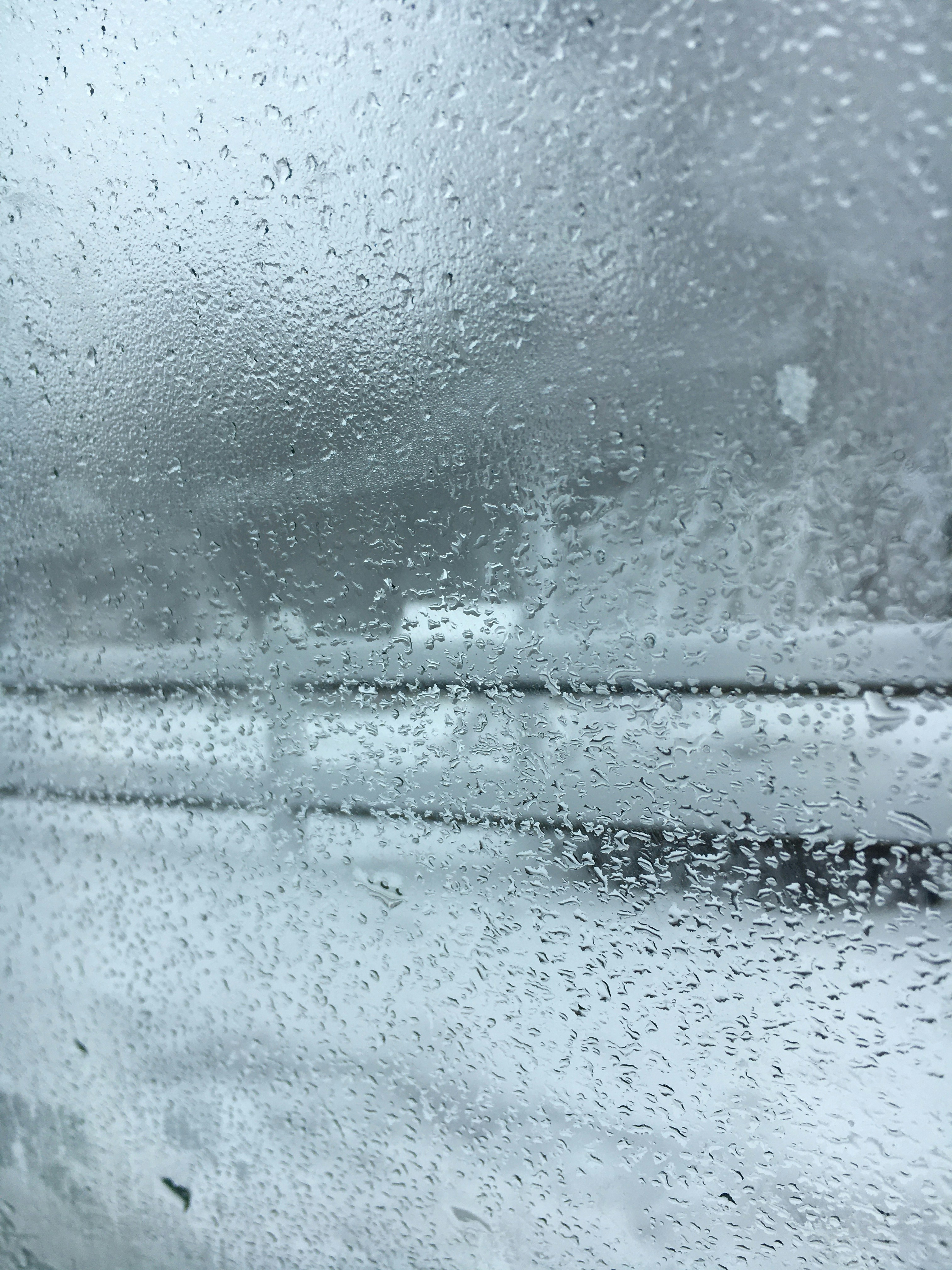 Rain drops on the window of a bus photo – Free Snowy day Image on ...