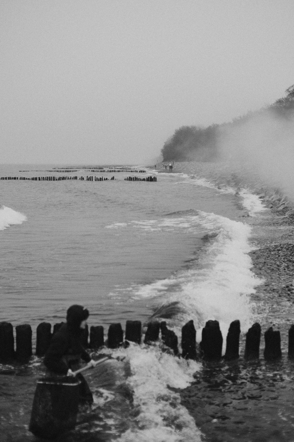 a person riding a surfboard on a wave in the ocean