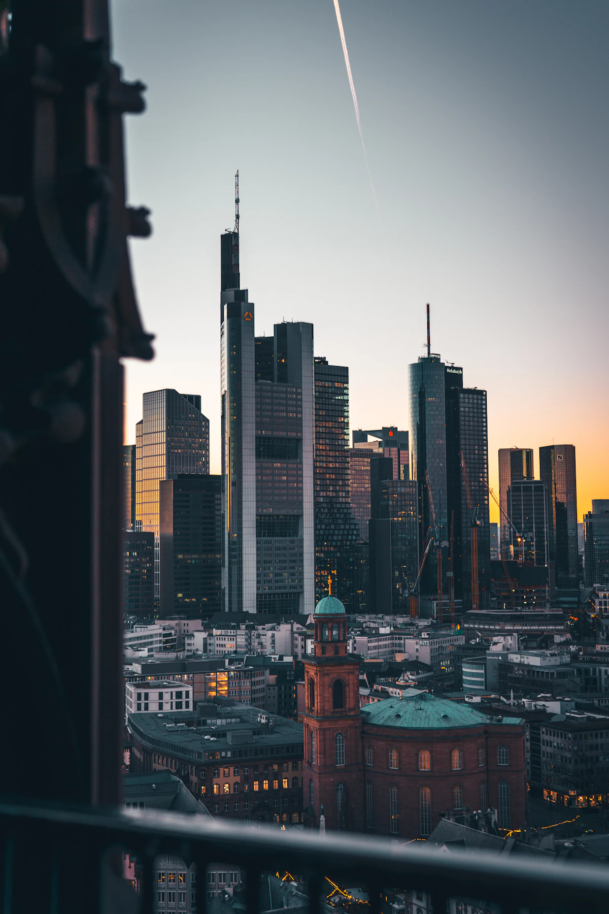 View of the Frankfurt am Main skyline and Römer old town at sunset