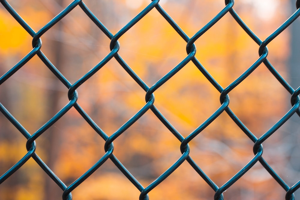 a close up of a chain link fence