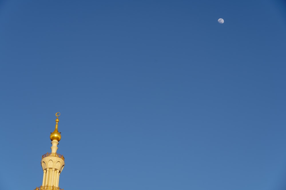 a tall building with a clock on it's side